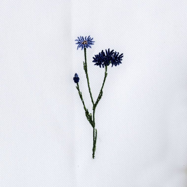 Flora serviet med kornblomst